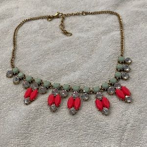 J. Crew necklace with hot pink and light blue gems. Adjustable length.